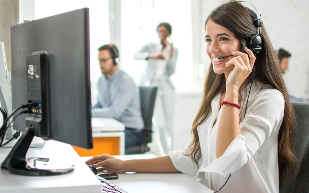 Sales professional confidently making a cold call at a modern office desk